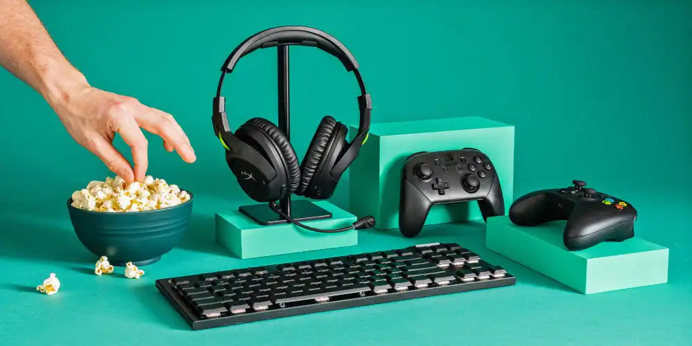 Black gaming headphones on a stand.